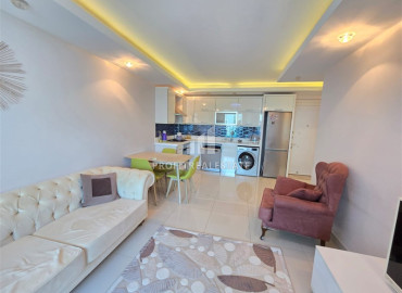 Симпатичная двухкомнатная квартира, 60м², в комфортабельном комплексе в 200м от моря в Махмутларе, Алания под ВНЖ ID-19612 фото-2