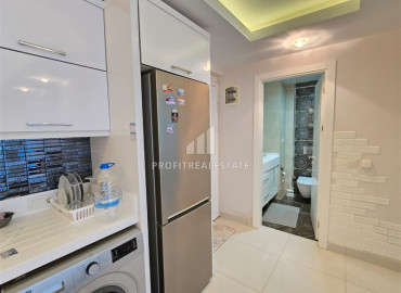 Симпатичная двухкомнатная квартира, 60м², в комфортабельном комплексе в 200м от моря в Махмутларе, Алания под ВНЖ ID-19612 фото-7