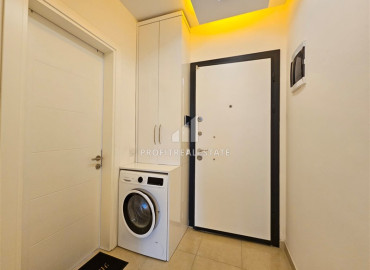 Стильные двухкомнатные апартаменты, 58м², в комплексе премиум класса, в восточной части Махмутлара, Алания ID-19616 фото-4