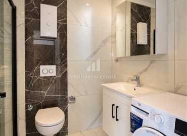 Двухкомнатная квартира, 65м², с дизайнерским интерьером в комплексе премиум класса в Каргыджаке, Алания ID-19622 фото-11