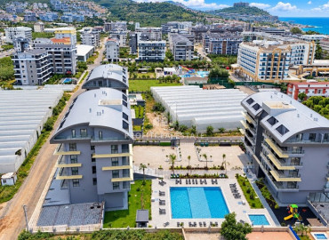Двухкомнатная квартира, 65м², с дизайнерским интерьером в комплексе премиум класса в Каргыджаке, Алания ID-19622 фото-17
