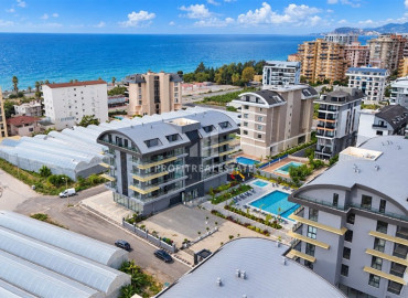 Двухкомнатная квартира, 65м², с дизайнерским интерьером в комплексе премиум класса в Каргыджаке, Алания ID-19622 фото-18
