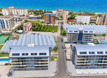 Двухкомнатная квартира, 65м², с дизайнерским интерьером в комплексе премиум класса в Каргыджаке, Алания ID-19622 фото-20
