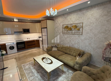 Элитная двухкомнатная квартира, 70м², в комплексе с отельной инфраструктурой, в 400 метрах от моря в Махмутларе, Алания ID-19625 фото-2