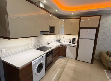 Элитная двухкомнатная квартира, 70м², в комплексе с отельной инфраструктурой, в 400 метрах от моря в Махмутларе, Алания ID-19625 фото-6
