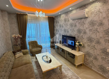 Элитная двухкомнатная квартира, 70м², в комплексе с отельной инфраструктурой, в 400 метрах от моря в Махмутларе, Алания ID-19625 фото-9