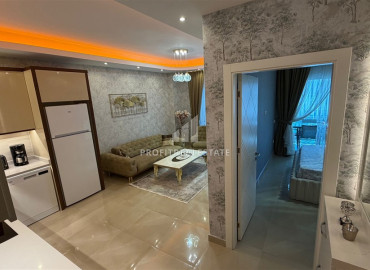 Элитная двухкомнатная квартира, 70м², в комплексе с отельной инфраструктурой, в 400 метрах от моря в Махмутларе, Алания ID-19625 фото-10
