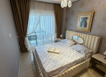 Элитная двухкомнатная квартира, 70м², в комплексе с отельной инфраструктурой, в 400 метрах от моря в Махмутларе, Алания ID-19625 фото-11