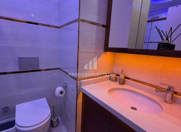 Элитная двухкомнатная квартира, 70м², в комплексе с отельной инфраструктурой, в 400 метрах от моря в Махмутларе, Алания ID-19625 фото-15