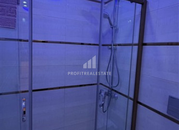 Элитная двухкомнатная квартира, 70м², в комплексе с отельной инфраструктурой, в 400 метрах от моря в Махмутларе, Алания ID-19625 фото-17