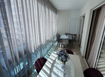 Элитная двухкомнатная квартира, 70м², в комплексе с отельной инфраструктурой, в 400 метрах от моря в Махмутларе, Алания ID-19625 фото-18