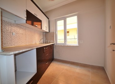 Квартира планировки 1+1 с отдельной кухней по очень низкой цене 23 000 евро в Махмутларе, Алания, 65 кв.м. ID-1654 фото-4