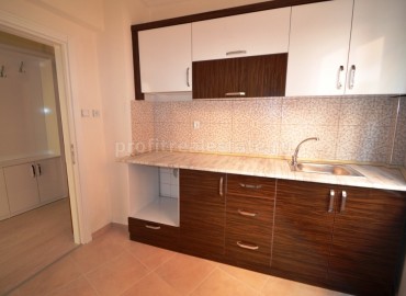 Квартира планировки 1+1 с отдельной кухней по очень низкой цене 23 000 евро в Махмутларе, Алания, 65 кв.м. ID-1654 фото-5