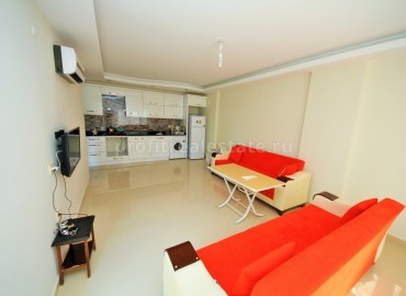 Апартаменты с мебелью и бытовой в 250 метрах от Средиземного моря в центре района Махмутлар ID-1708 фото-1