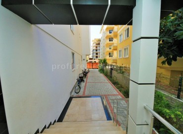 Апартаменты с мебелью и бытовой в 250 метрах от Средиземного моря в центре района Махмутлар ID-1708 фото-15