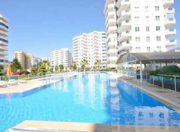 Апартаменты планировки 1+1 в курортном районе Махмутлар всего в 450 метрах от Средиземного моря. ID-1831 фото-1