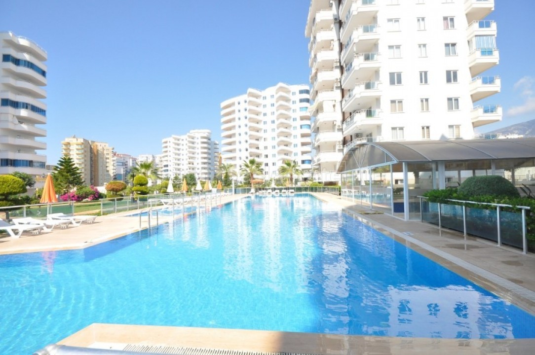 Апартаменты планировки 1+1 в курортном районе Махмутлар всего в 450 метрах от Средиземного моря. ID-1831 фото-1