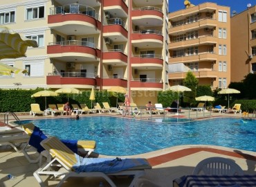 Меблированная квартира в комплексе с бассейном, Махмутлар, Алания, Турция. Стоимость ежемесячного обслуживания комплекса  - 125 турецких лир. ID-0006 фото-1