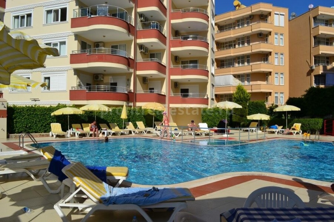 Меблированная квартира в комплексе с бассейном, Махмутлар, Алания, Турция. Стоимость ежемесячного обслуживания комплекса  - 125 турецких лир. ID-0006 фото-1