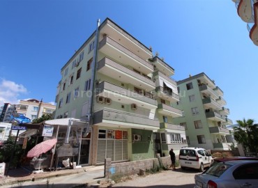 Бюджетные, трехкомнатные апартаменты в доме городского типа в районе Махмутлар, в 300 метрах от чистых пляжей района., 110 кв.м. ID-1991 фото-1