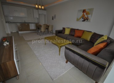 Квартира планировкой 1+1 со стильной мебелью в Махмутларе, Алания, 90 кв.м. ID-2128 фото-1