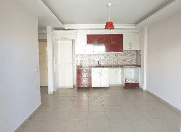 Недорогая двухкомнатная квартира в Махмутларе, 65 кв.м. ID-2200 фото-2