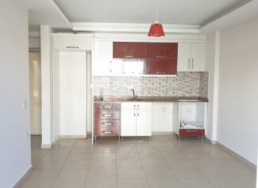 Недорогая двухкомнатная квартира в Махмутларе, 65 кв.м. ID-2200 фото-3