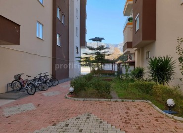 Недорогая двухкомнатная квартира в Махмутларе, 65 кв.м. ID-2200 фото-17