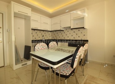 Квартира с мебелью в комплексе с крытым бассейном на 10 этаже в районе Махмутлар., Алания, 60 кв.м. ID-2275 фото-7