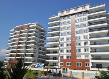 Апартаменты 1+1 в новом комплексе с крытым бассейном в районе Махмутлар ID-2346 фото-3