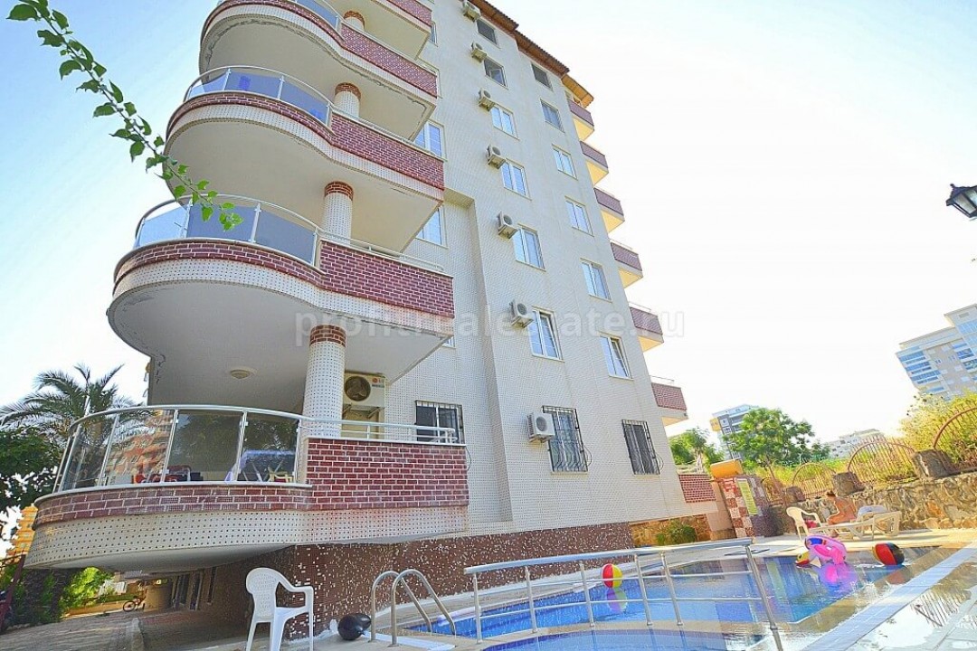 Светлые апартаменты в комплексе с бассейном в районе Махмутлар ID-0039 фото-1