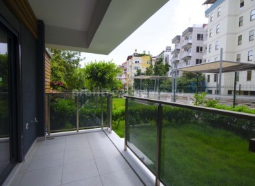 Новая двухкомнатная квартира в центре Алании с выходом в сад, 50 м2 ID-2755 фото-11