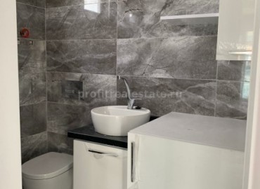 Двухкомнатная квартира в Махмутларе в новом доме ID-2813 фото-6