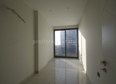 Трехкомнатная квартира на первой береговой линии в районе Махмутлар ID-2840 фото-2