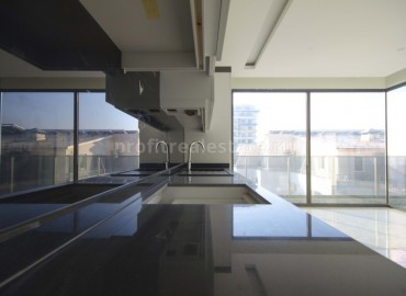 Трехкомнатная квартира на первой береговой линии в районе Махмутлар ID-2840 фото-11