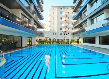 Трехкомнатная квартира на первой береговой линии в районе Махмутлар ID-2840 фото-15