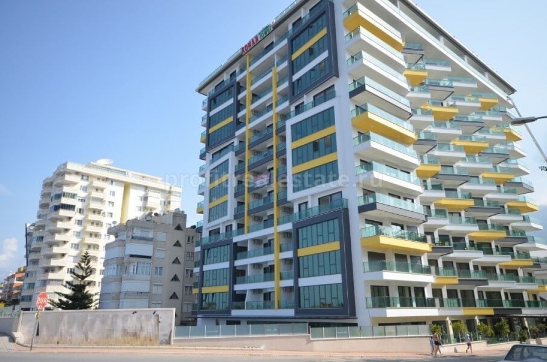 Квартиры в жилом комплексе на первой линии в Махмутларе, Алания ID-0061 фото-1