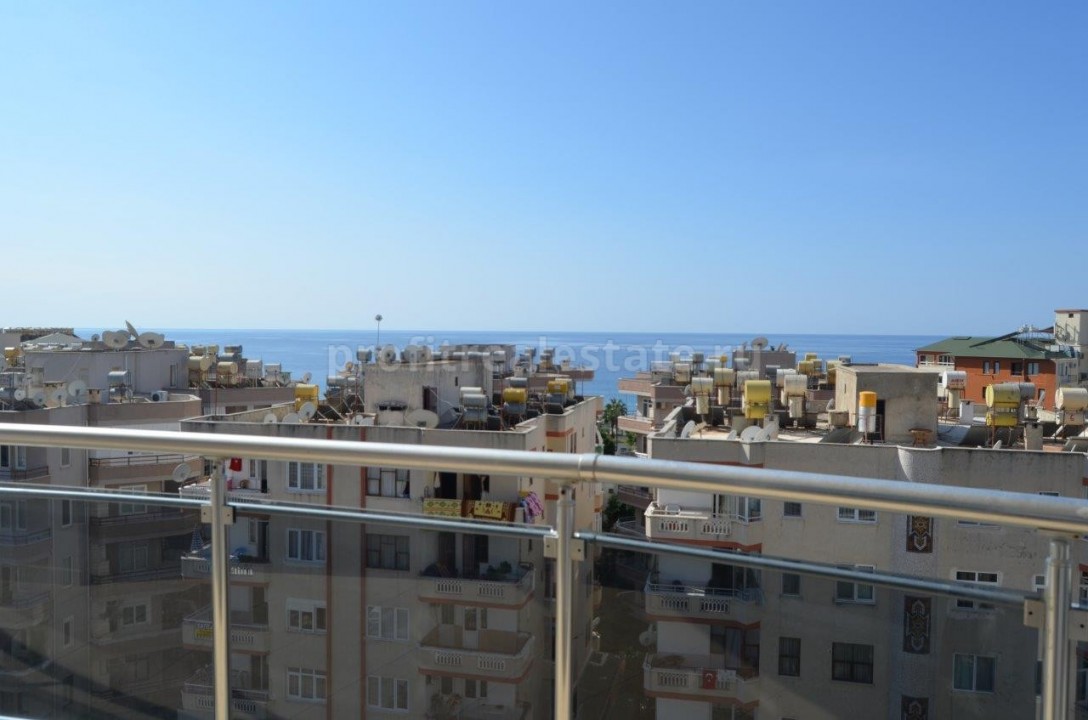 Apartment with sea view in the center of the resort area of Mahmutlar ID-0098 фото-1