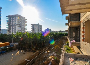 Недорогие квартиры на стадии строительства в Махмутларе, 55 м2 ID-3203 фото-14
