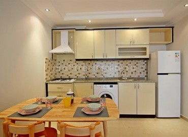 Уютная двухкомнатная квартира с мебелью и техникой, 65м.кв. в Махмутларе ID-3235 фото-4