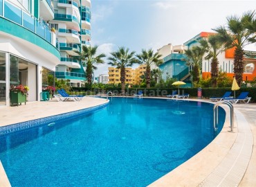 Меблированная двухкомнатная квартира в закрытом комплексе, 50м.кв. в Махмутларе ID-3241 фото-1