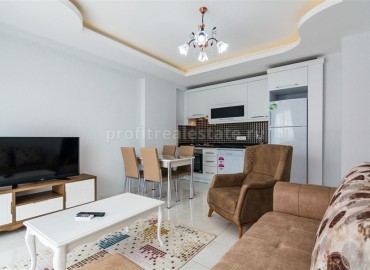 Меблированная двухкомнатная квартира в закрытом комплексе, 50м.кв. в Махмутларе ID-3241 фото-2