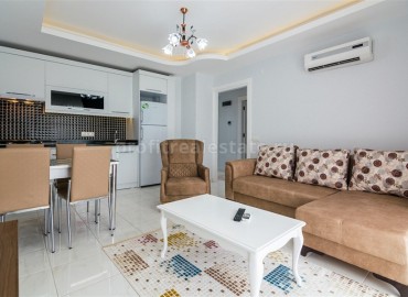 Меблированная двухкомнатная квартира в закрытом комплексе, 50м.кв. в Махмутларе ID-3241 фото-4