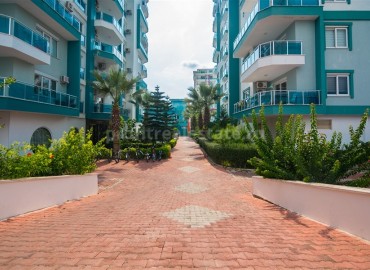 Меблированная двухкомнатная квартира в закрытом комплексе, 50м.кв. в Махмутларе ID-3241 фото-12