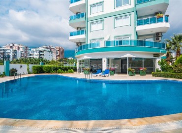 Меблированная двухкомнатная квартира в закрытом комплексе, 50м.кв. в Махмутларе ID-3241 фото-17