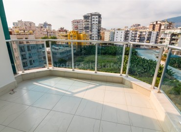 Меблированная двухкомнатная квартира в закрытом комплексе, 50м.кв. в Махмутларе ID-3241 фото-24