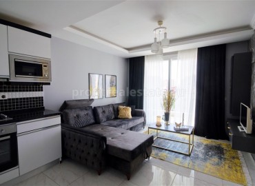 Укомплектованная мебелью, бытовой техникой и кондиционерами двухкомнатная квартира в районе Махмуталар ID-3242 фото-2