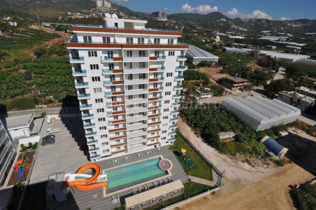 Новая двухкомнатная квартира в престижном жилом комплексе в Махмутларе, 75 м2 ID-3313 фото-2
