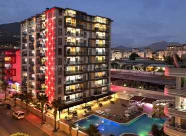 Комплекс с квартирами различных планировок недалеко от пляжа Клеопатры в центре Алании, Турция ID-0131 фото-1