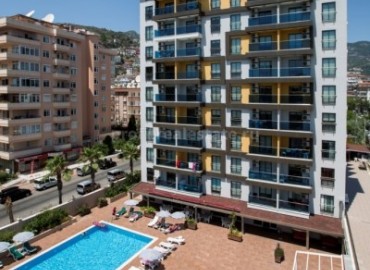 Комплекс с квартирами различных планировок недалеко от пляжа Клеопатры в центре Алании, Турция ID-0131 фото-4